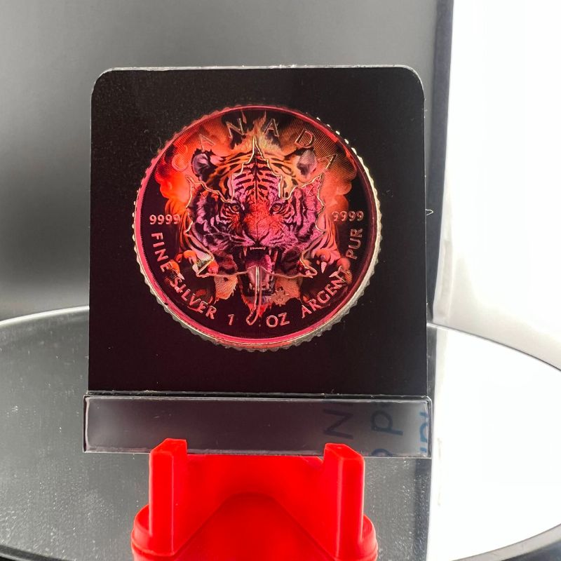 2023 Maple Leaf coin featuring a Burning Tiger design with flames, showcasing the fierce and dynamic theme of the coin.