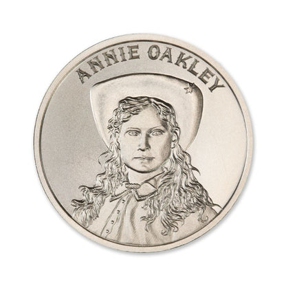 Annie Oakley 1 Troy Ounce 39mm Silver Round featuring a detailed depiction of Wild Bill Hickok and iconic old west imagery.