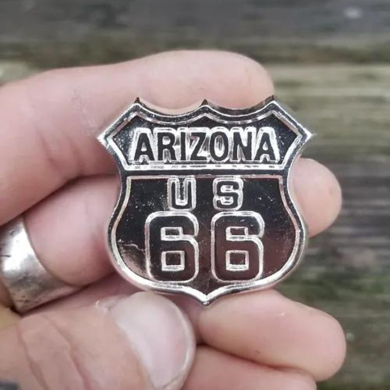 Arizona Route 66 Silver Round - Intricately designed silver piece featuring iconic symbols of the Arizona desert.