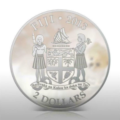 Fiji 2013 $2 Pomeranian My Little Puppy 1 Oz Silver Coin featuring a detailed depiction of a playful Pomeranian puppy.