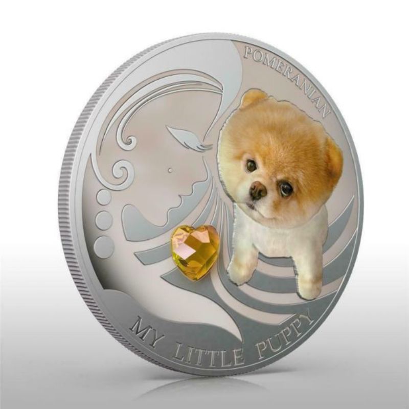 Fiji 2013 $2 Pomeranian My Little Puppy 1 Oz Silver Coin featuring a detailed depiction of a playful Pomeranian puppy.