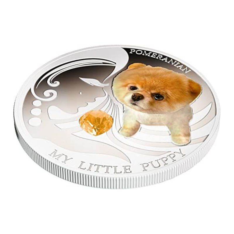 Fiji 2013 $2 Pomeranian My Little Puppy 1 Oz Silver Coin featuring a detailed depiction of a playful Pomeranian puppy.