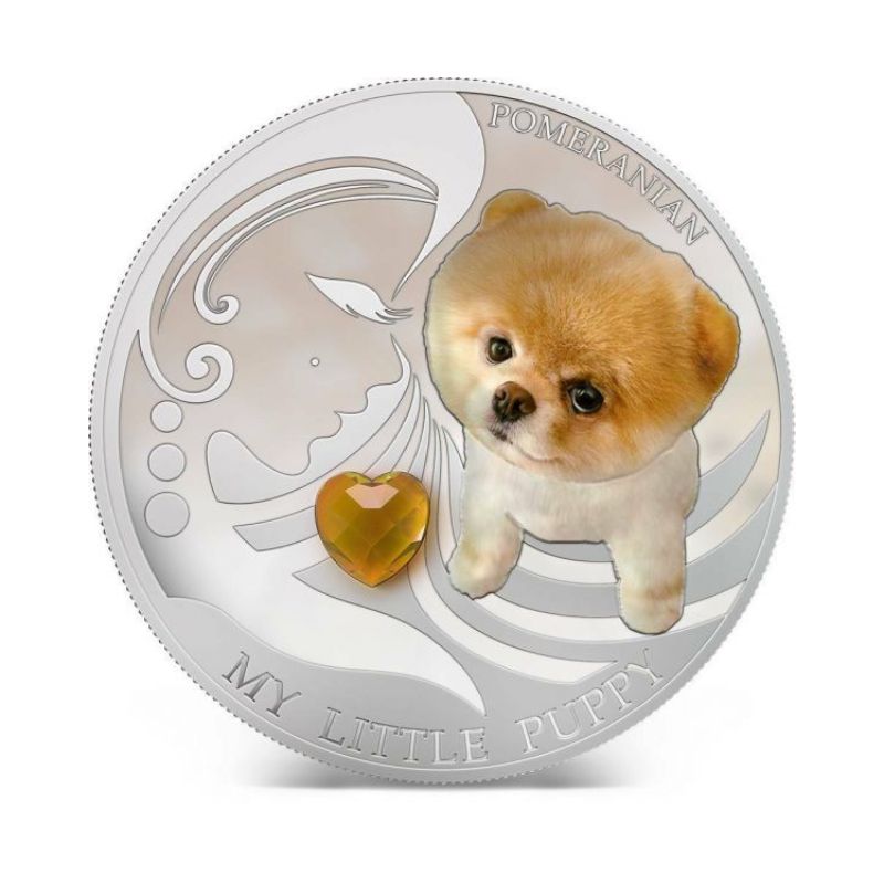 Fiji 2013 $2 Pomeranian My Little Puppy 1 Oz Silver Coin featuring a detailed depiction of a playful Pomeranian puppy.