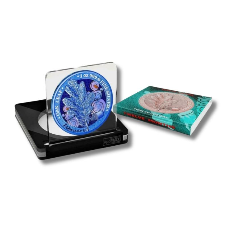 Germania 2019 5 Mark Oak Leaf February Coin in .999 fine silver with vibrant blue design and detailed oak leaf.