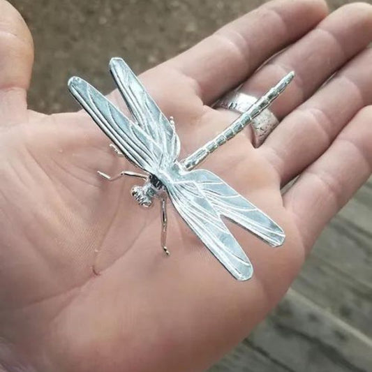 Hand-poured silver bar featuring an intricate Dragonfly design, capturing the delicate beauty and patterns of this enchanting insect.