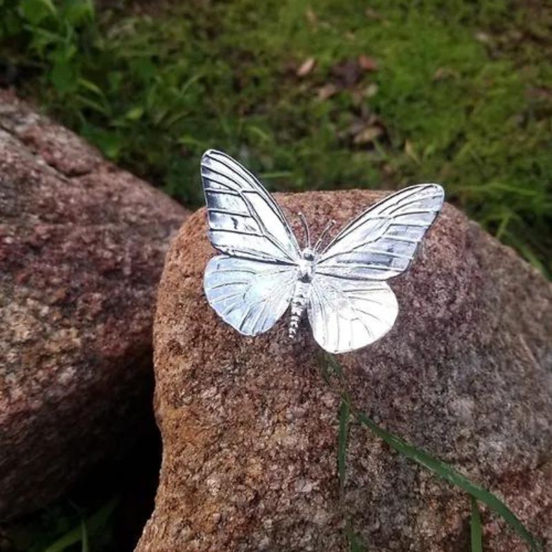 Hand-poured silver bar featuring the intricate design of a Monarch Butterfly, highlighting its delicate wings and patterns.