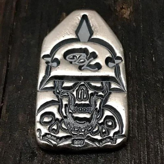 Hand-poured silver bar with intricate leaf and natural element designs, reflecting the spirit of environmental stewardship and mindful conservation.