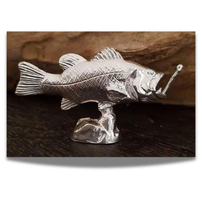 Large Mouth Bass Hand-Poured Silver Bar showcasing intricate details of the fish, including fins and scales, with a reflective surface that mimics sunlit waters.