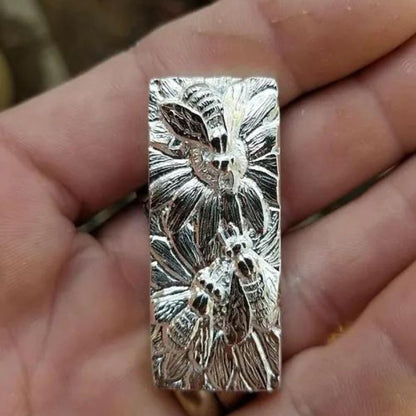 Nature's Helper Hand-Poured Silver - Unique, artisanal silver piece reflecting the beauty of the natural world.