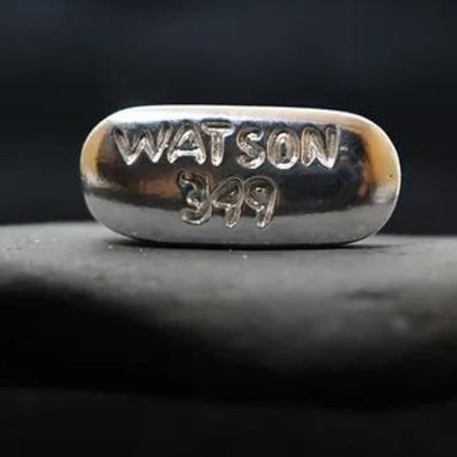 WATSON 349 - Vicodin Hand-Poured Silver - Artisan-crafted silver ingot with a unique design blending medical and artistic elements.