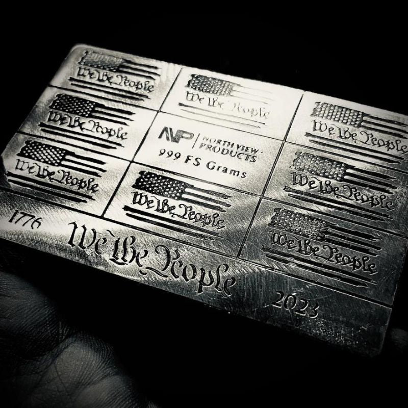 We The People' Gramsy Card Hand Poured Silver with intricate patriotic design and symbols of liberty.