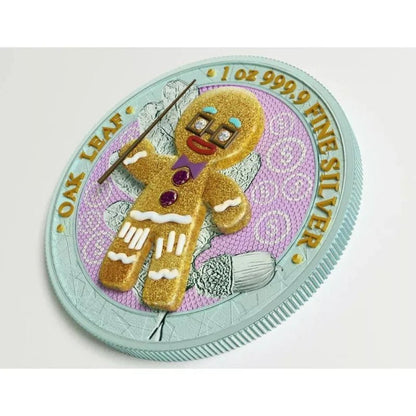 2019 Germania Oak Leaf Bejeweled Gingerbread - Teacher 1 oz silver coin featuring a decorated gingerbread teacher.